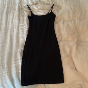 Fitted black ribbed dress